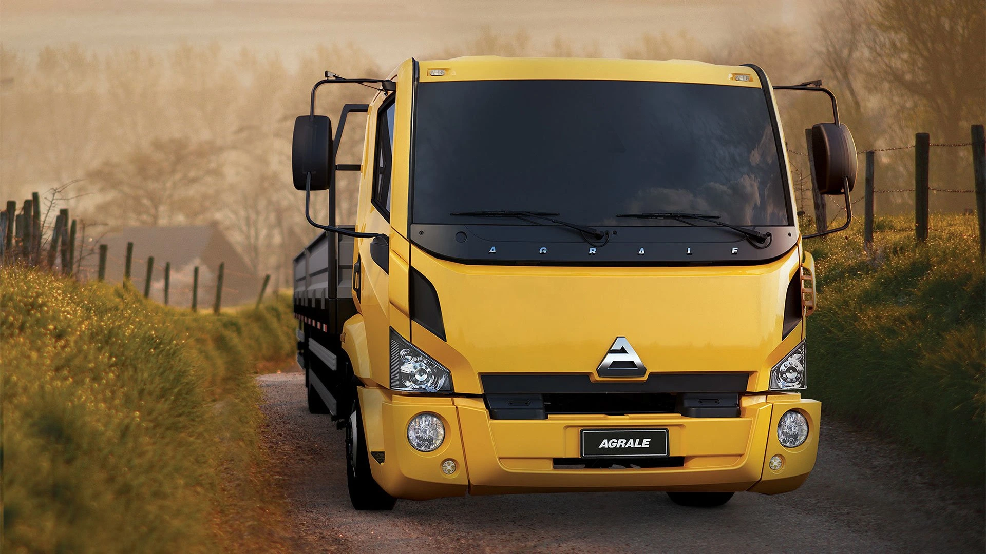 Caminhão Agrale amarelo em vista frontal